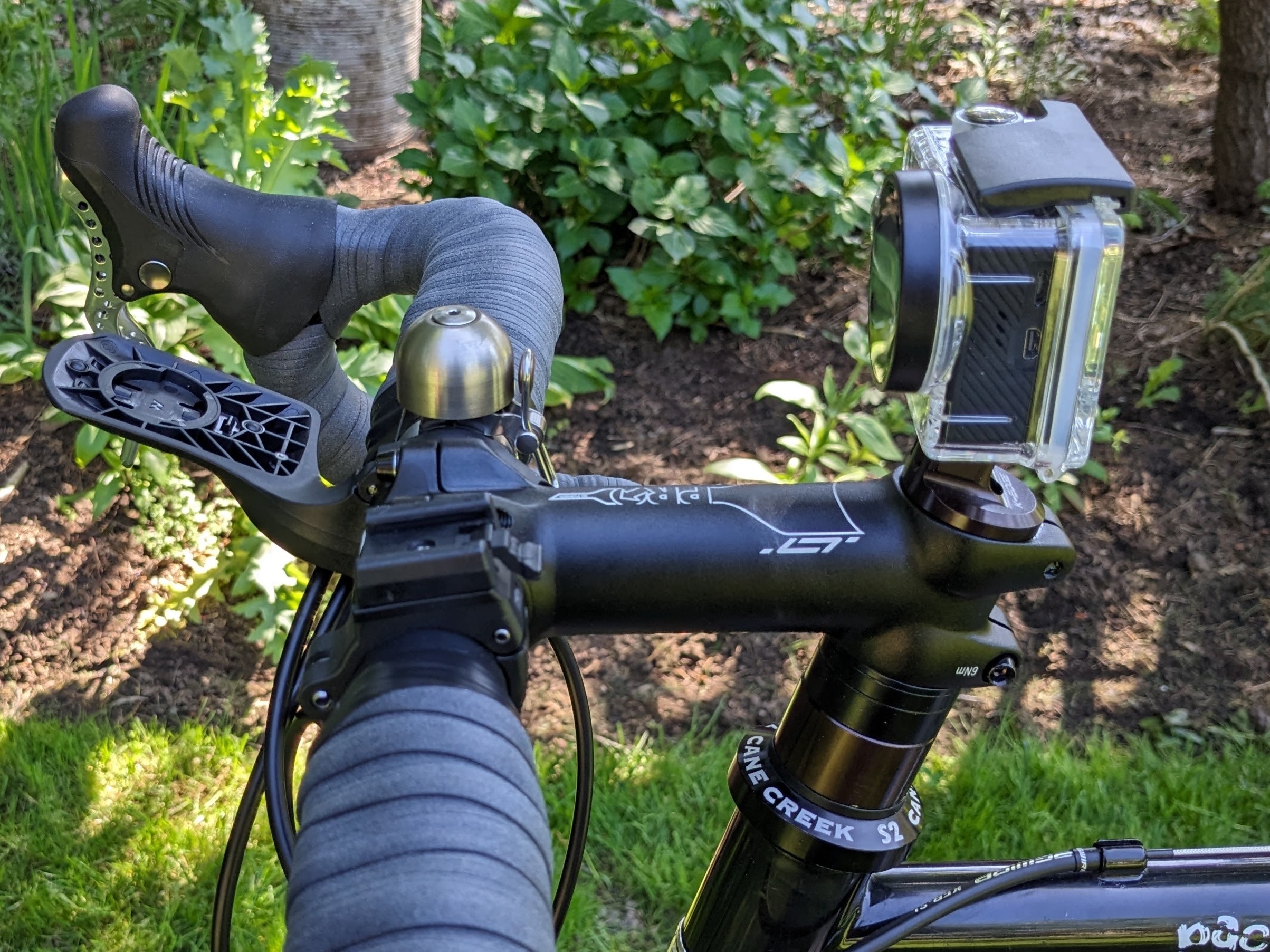 k-edge brand GoPro top cap mount on a bicycle with an action camera