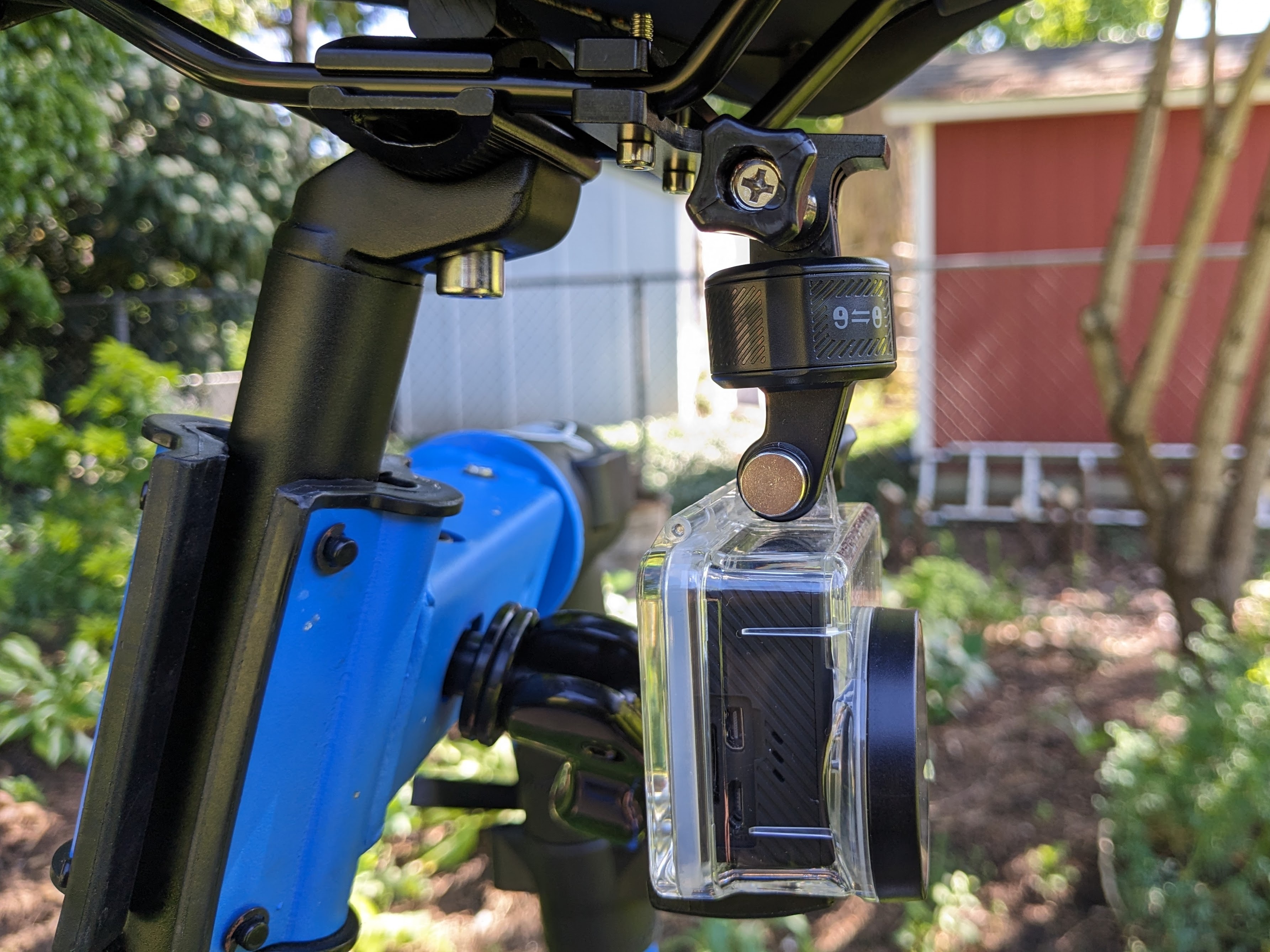 ParaPace Bicycle Saddle Rail Camera Mount in use with action camera mounted to a bicycle